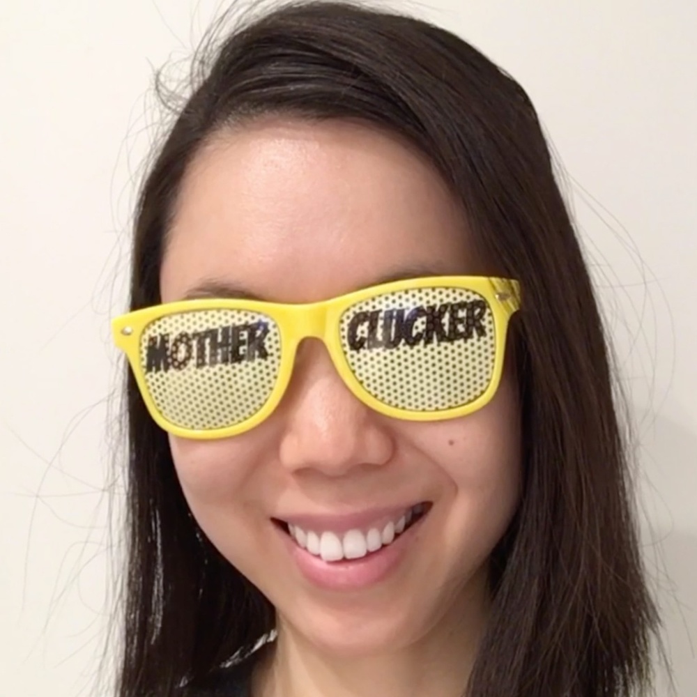 Funny Yellow Sunglasses with "Mother Clucker" text